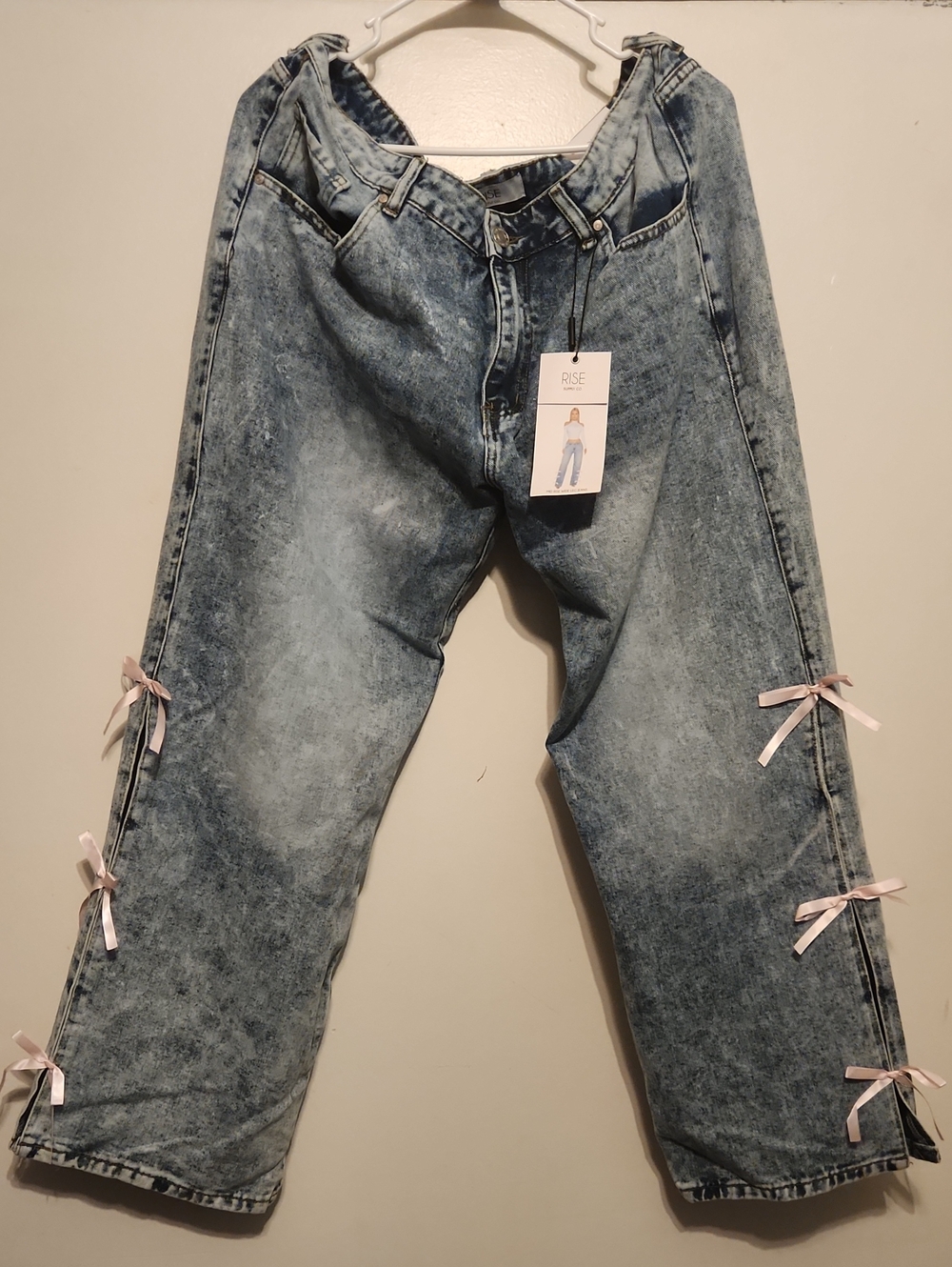 Women's Light Wash Blue Denim Jeans with Pink Bow Details